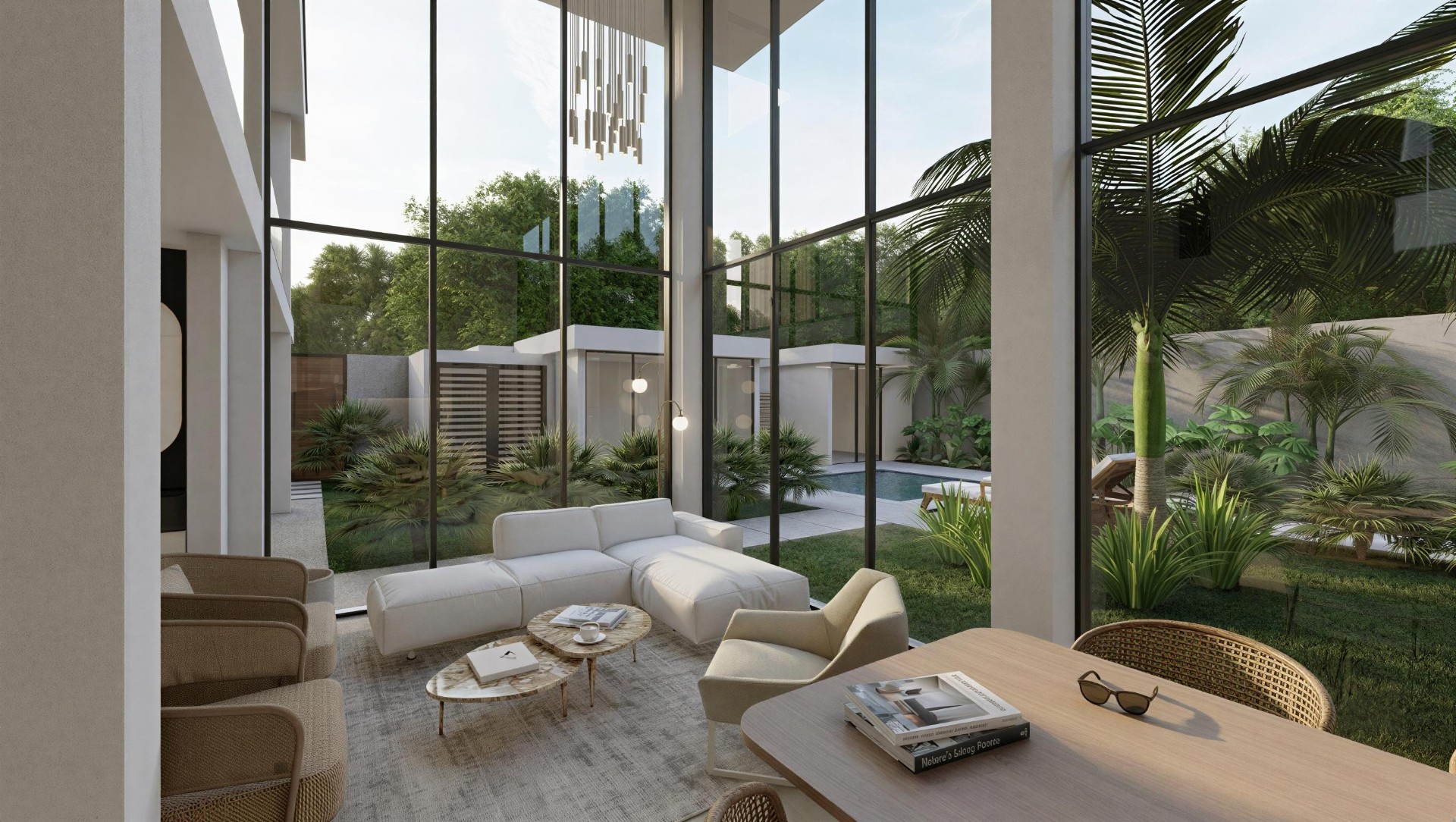 Sala con ventanal de doble altura al jardín tropical